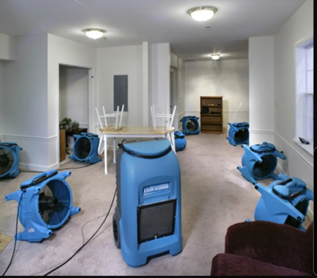 Air movers and dehumidifier setup for Water Damage Restoration in Tyrone